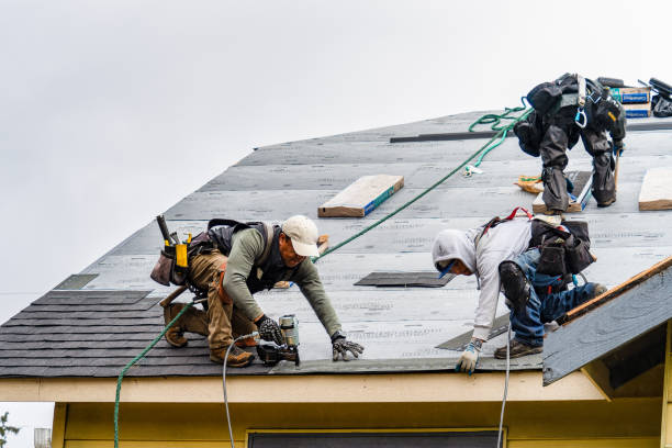 Professional Gutter Installation technician working in El Granada, CA